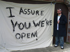 I Assure You We're Open sheet sign from Clerks movie