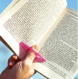 Thumb clip to keep book held open
